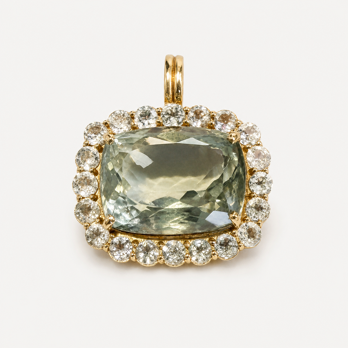 Front view of the Amira pendant: cushion-cut olive green amethyst surrounded by white sapphires in 18K gold.