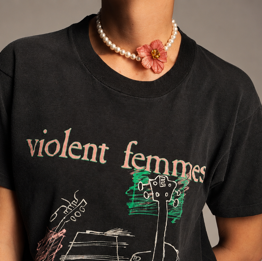 Bianca pearl choker with a pink opal flower and citrine centre, styled with a black graphic T-shirt.
