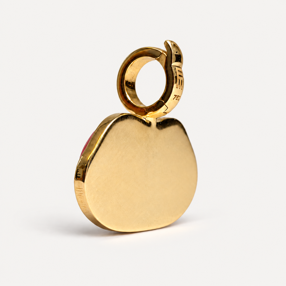 Back of the Dina coral lips pendant, showing the solid 18K gold backing and circular hinged bail.
