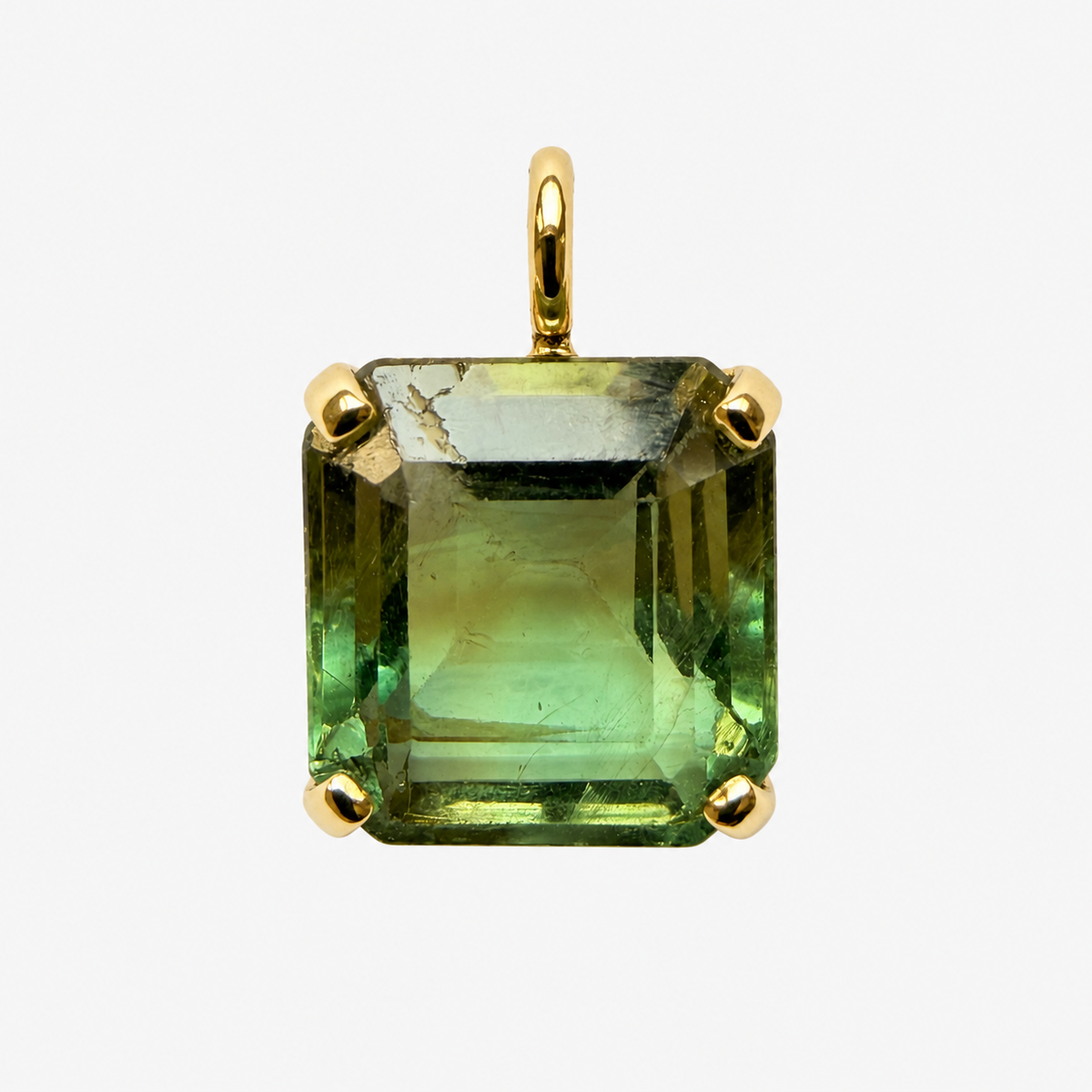 Rectangular step-cut green fluorite charm with four 18K gold corner claws and a polished gold bail, front view.