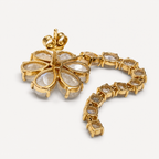 Back of the Nayla moonstone drop earring, showing open gold settings, articulated stone links and a butterfly fastening.