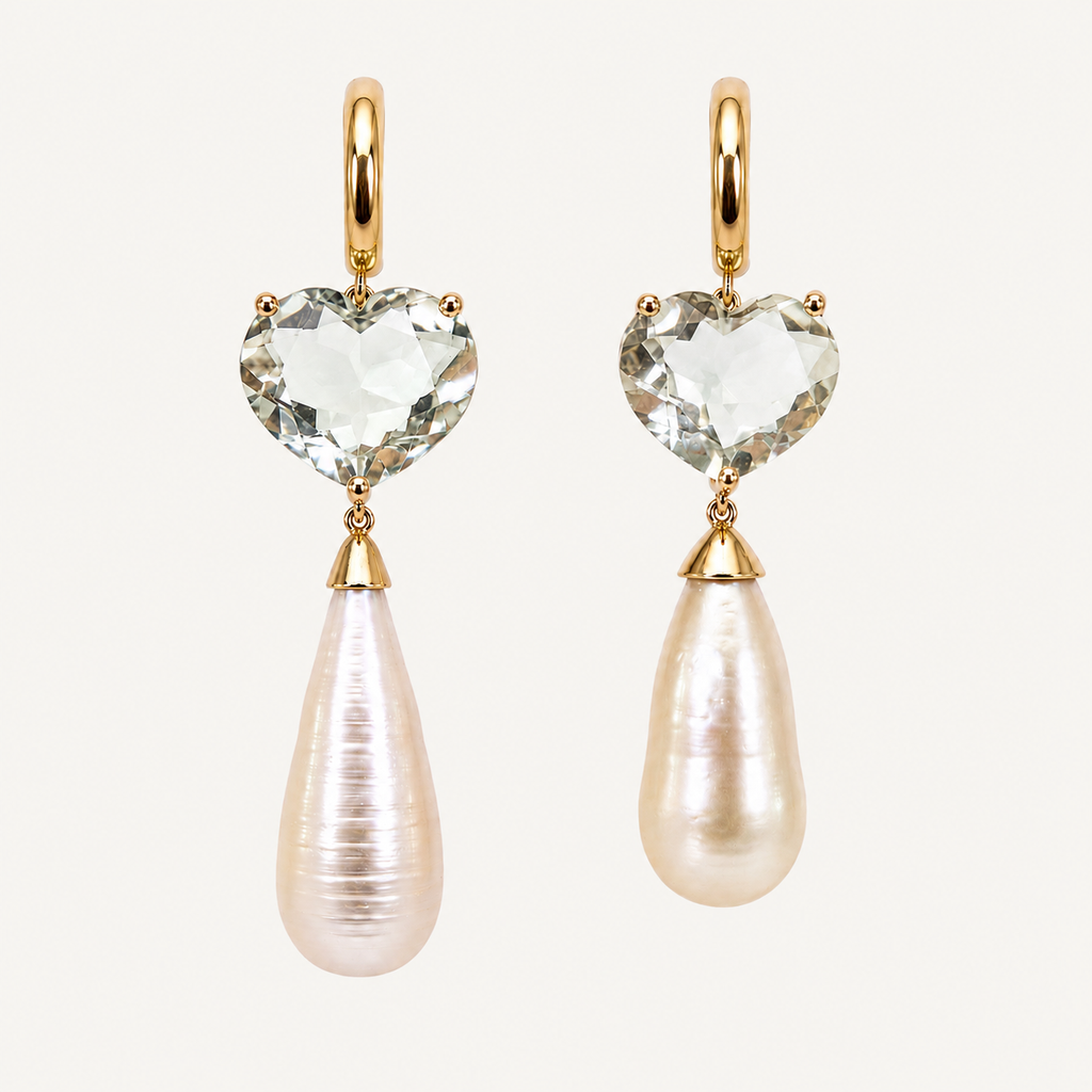 Pair of Sandy 18K gold earrings with pale green heart-shaped gemstones and two individually shaped freshwater pearl drops.