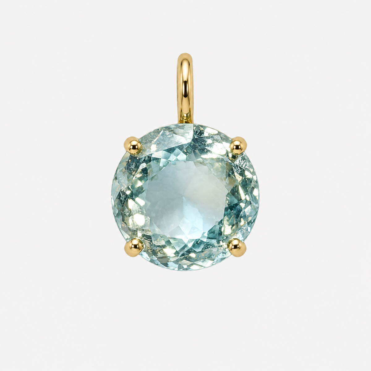 Round pale blue topaz charm in a four-claw 18K gold setting with a polished gold bail, front view.